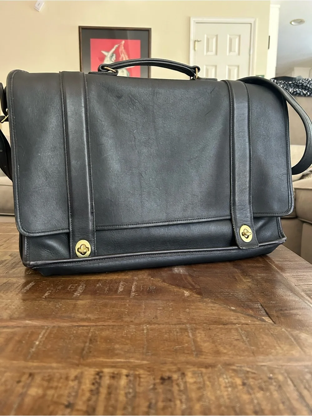 Coach Black Leather Messenger Bag with Gold Hardware